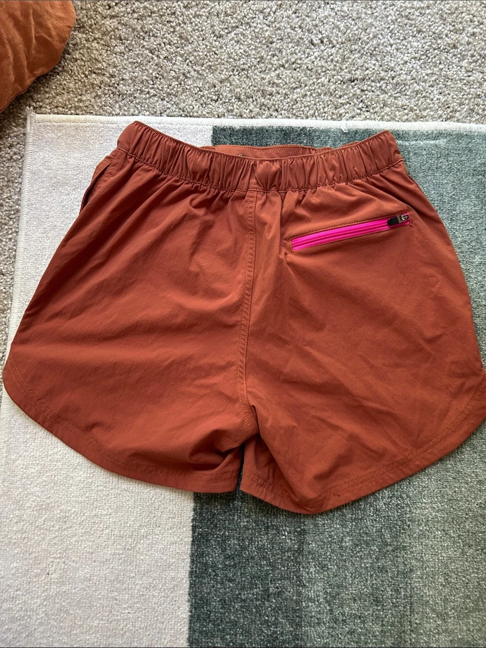 Topo Designs Rust Athletic Shorts with Pink Belt